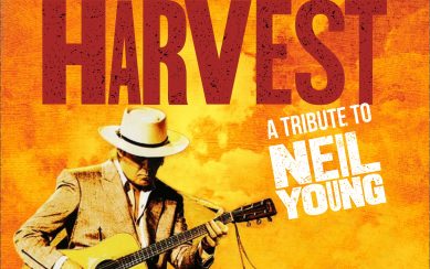 Graphic of Neil Young tribute artist playing guitar against an orange/yellow background