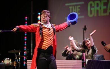 Young man dressed as the Greatest Showman