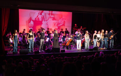 Teenagers performing on stage