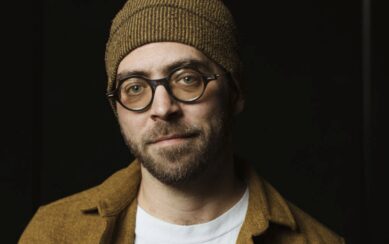 photo of Aaron Parks in a hat 