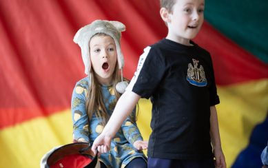 An image of children during a performance