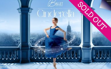 A ballerina in a blue dress, twirling in a dance