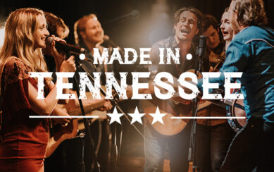 A photograph of a group of singers around a microphone. At the forefront is the title "Made in Tennessee" in large white letters