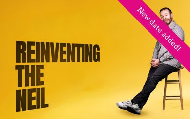 Neil Delamere sitting in a chair