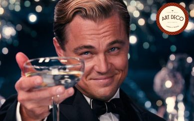 Leonardi DiCaprio holding out a martini glass in Great Gatsby movie poster