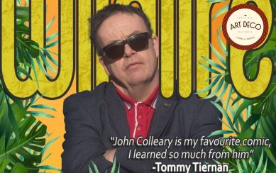 A poster of John Colleary wearing sunglasses, with bold yellow text reading “Wildfire” in the background