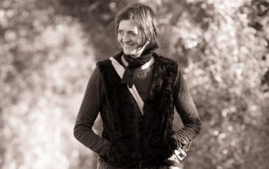 Black and white photo of Amy O'Hara smiling.