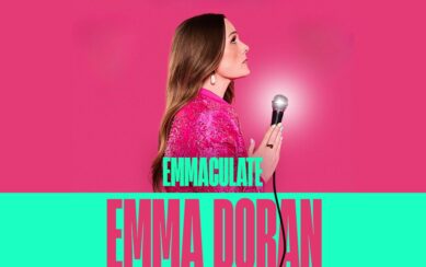 side profile of woman holding microphone against pink background