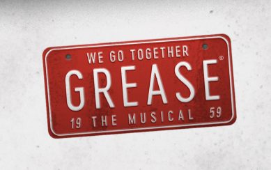 A red plate with the title of the show on a grey background