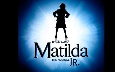 A silhouette of a girl at the centre of a blue burst A silhouette of a girl at the centre of a blue burst