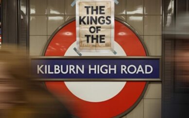 The show title on a metro wall