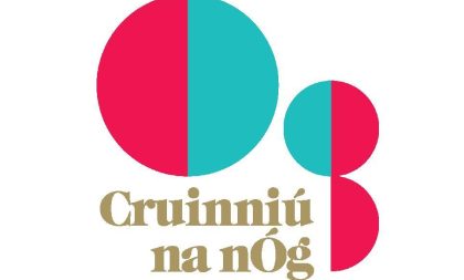 Cruinniu na nOg logo in blue and red with gold lettering