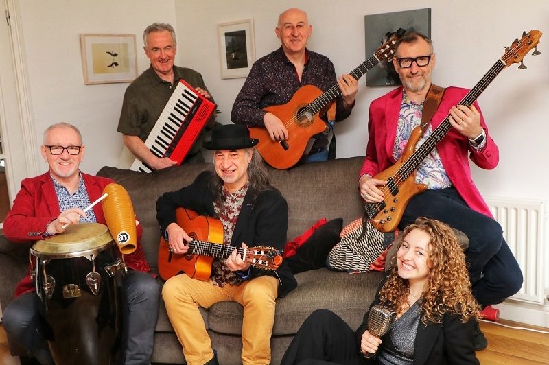 A group photograph of Felip Carbonell with fellow musicians. A group photograph of Felip Carbonell with fellow musicians.