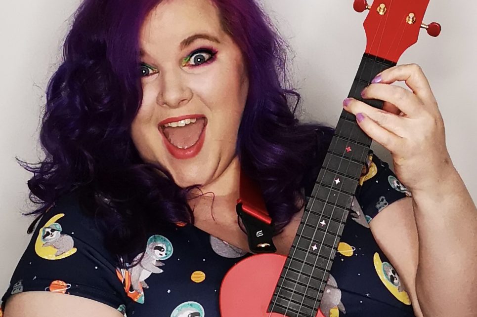 Musician Lisa Cannon posing with a ukulele Musician Lisa Cannon posing with a ukulele