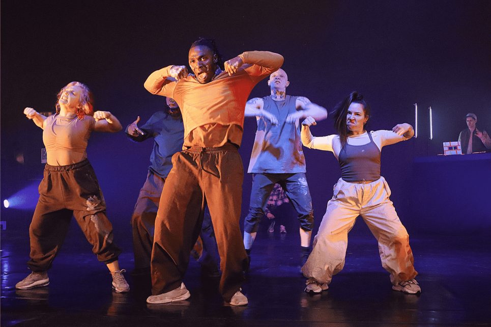 Five performers danced across the stage