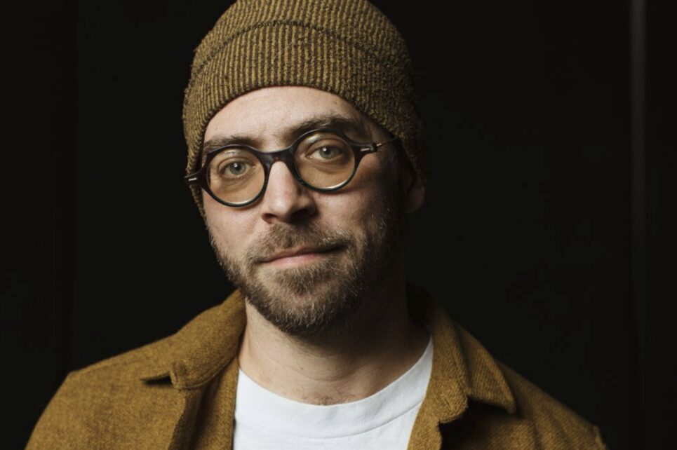 photo of Aaron Parks in a hat