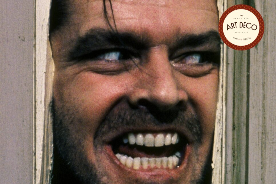 Jack Nicholson in The Shining putting his head through a door