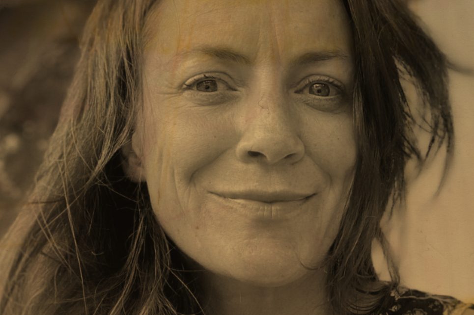 Close-up of smiling woman looking into the camera