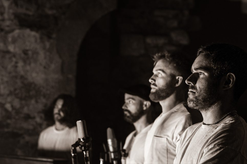 A black and white profile portrait of the group Onoir. A black and white profile portrait of the group Onoir.