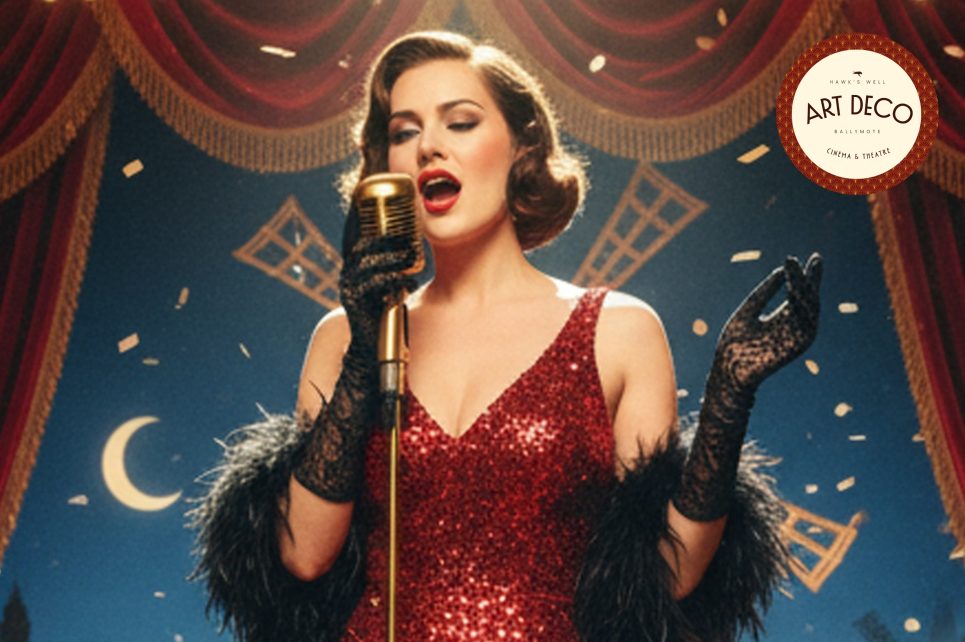 Cabaret singer on stage singing into a microphone Cabaret singer on stage singing into a microphone