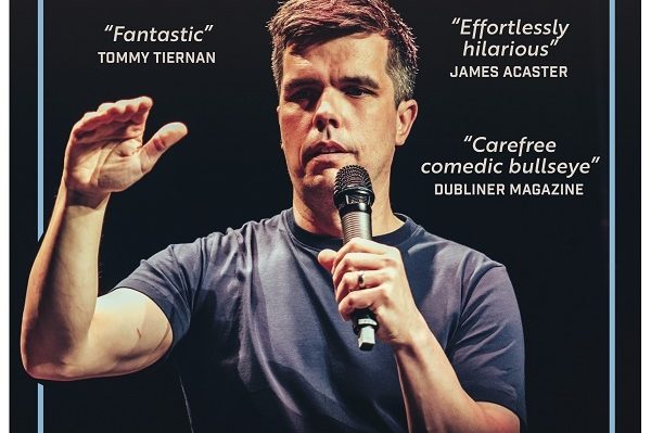 Poster for the comedy show Chris Kent Back At It. It features a photograph of Chris on stage mid-performance, his name and the show title above in large lettering