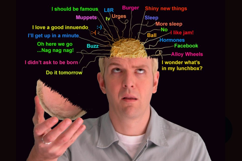 A humorous image of Ger Carey with the top of his head open, revealing spaghetti-like "brains" and various random, colorful thoughts labelled around it