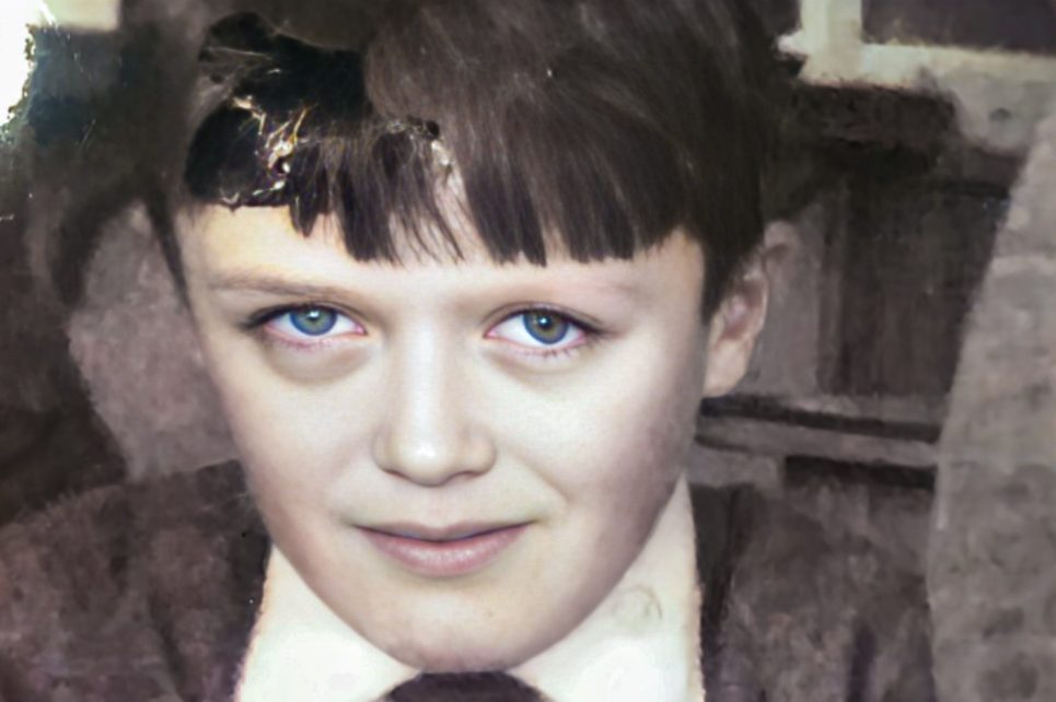 Sepia image of a young boy's face