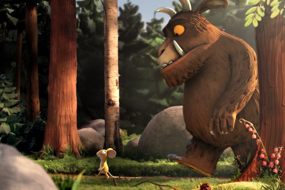 An illustration of The Gruffalo following a mouse through the woods.