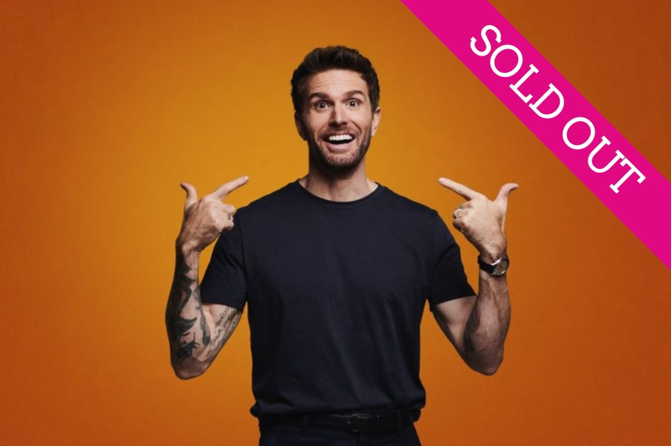 Joel Dommett smiles at the camera Joel Dommett smiles at the camera