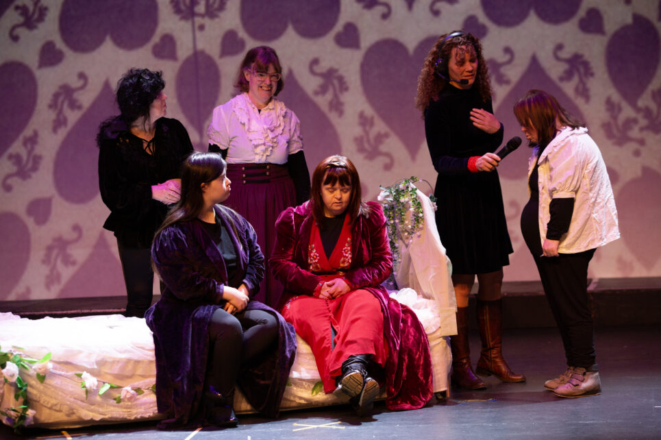 Actors on stage performing Romeo and Juliet