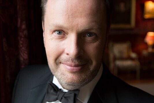 A portrait photograph of James Nelson A portrait photograph of James Nelson