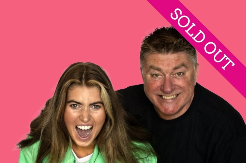 A photograph of Faye and Pat Shortt laughing.