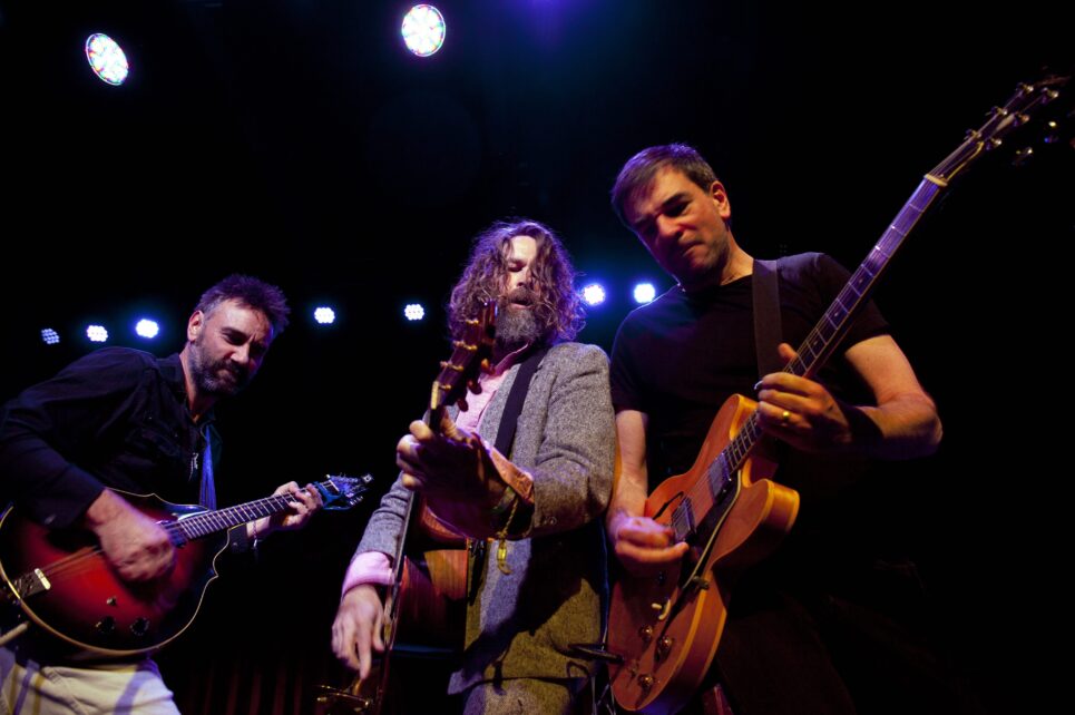 Three musicians on stage