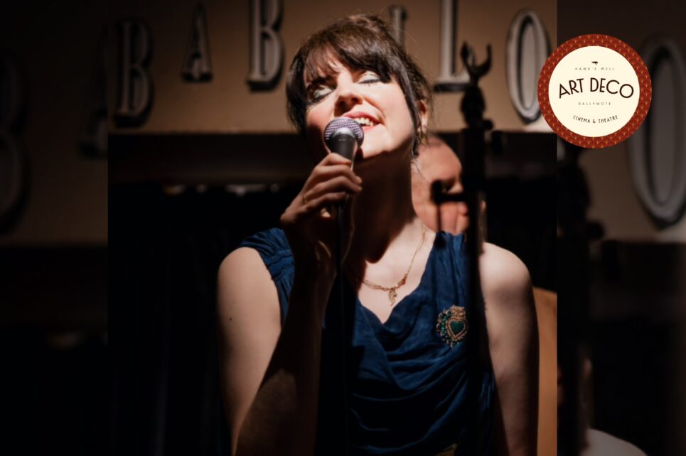 A photo of Liv Monaghan singing.