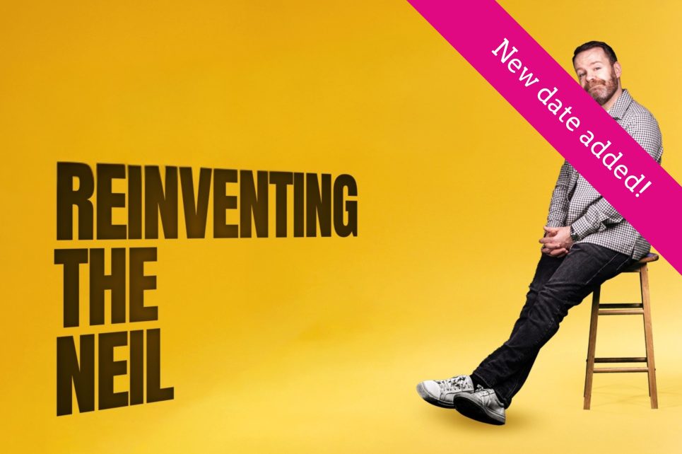 Neil Delamere sitting in a chair Neil Delamere sitting in a chair