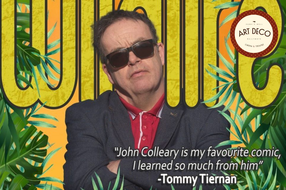 A poster of John Colleary wearing sunglasses, with bold yellow text reading “Wildfire” in the background
