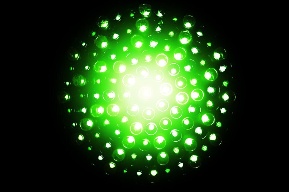 A circle of LED lights in shades of green