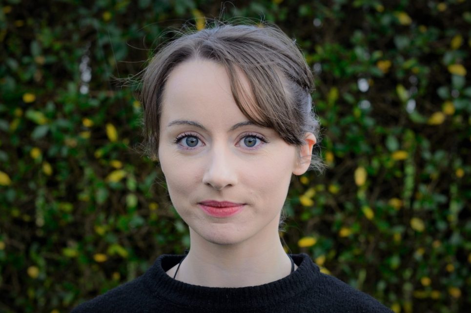 A portrait photograph of Miriam Needham A portrait photograph of Miriam Needham