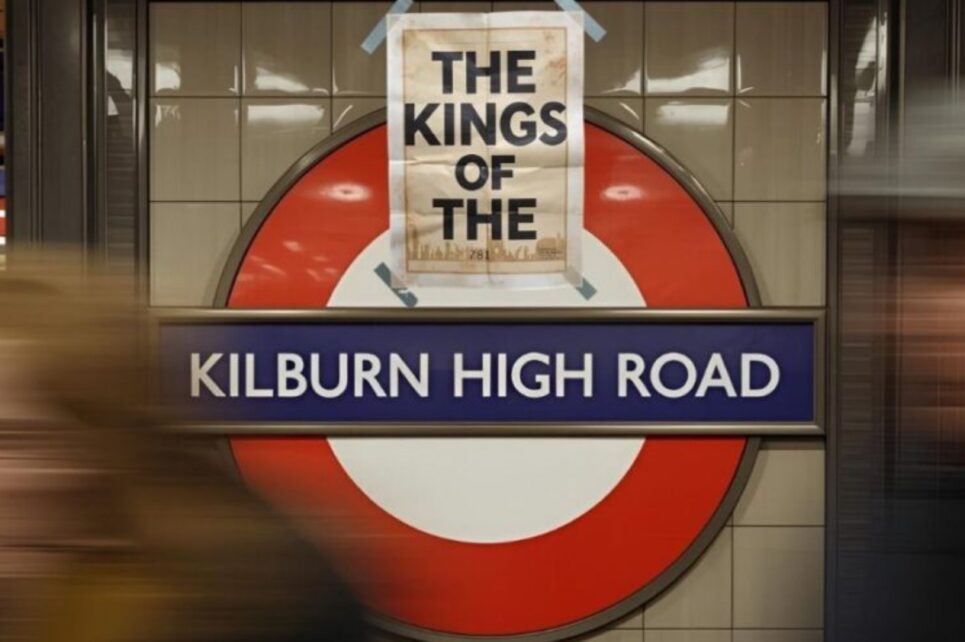 The show title on a metro wall